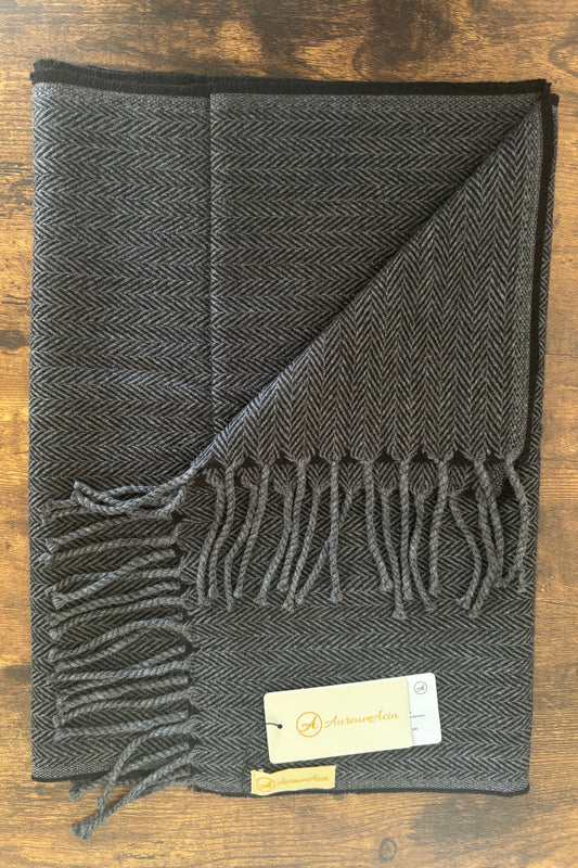 Charcoal and black woollen stole in herringbone pattern with fringes at the end 