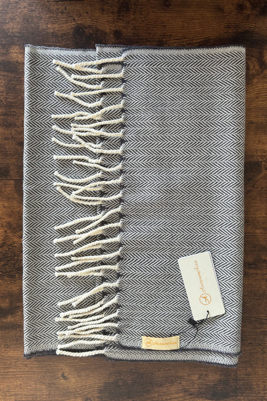 Grey and white herringbone woollen stole with fringes on ends