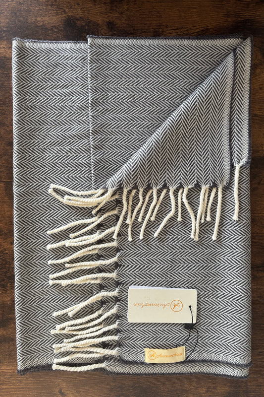 Grey and white herringbone woollen stole with fringes on ends