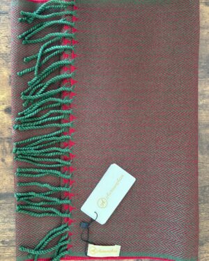 Red and bottle green woollen scarf in herringbone pattern with fringes at the end 