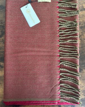 Red and dark olive woollen scarf in herringbone pattern with fringes at the end 