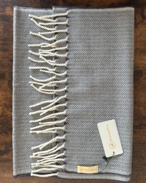Grey and white herringbone woollen scarf with fringes on ends